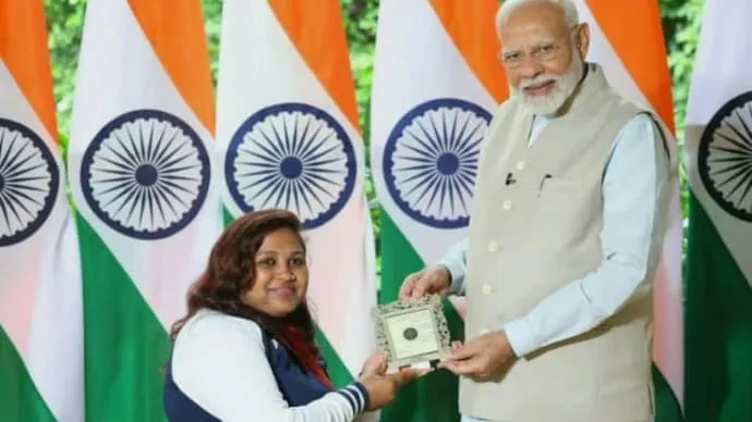 Mona Agarwal and Prime Minister Narendra Modi following India's record-breaking shooting performance at the Asian Para Games 2026