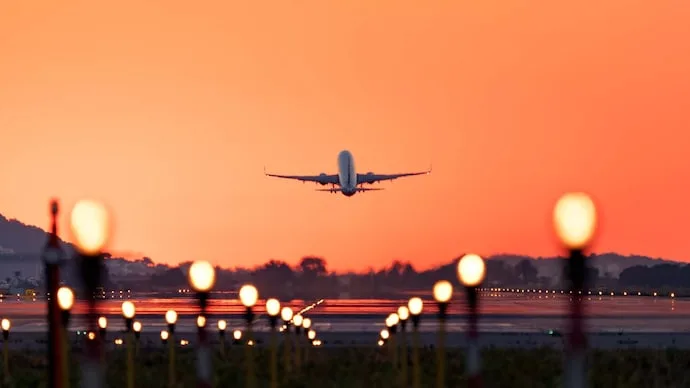 Commercial passenger aircraft representing the Supreme Court case on airfare regulation and ticket pricing in India.